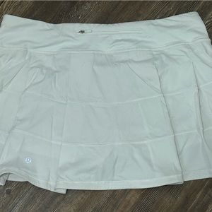Lululemon Mid Rise Tennis Running skirt w/ pockets, pleats